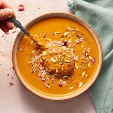 Sweet potato kheer in a bowl with spoon.