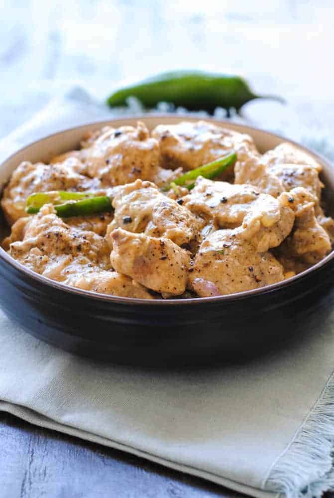 Pepper chicken in a bowl.