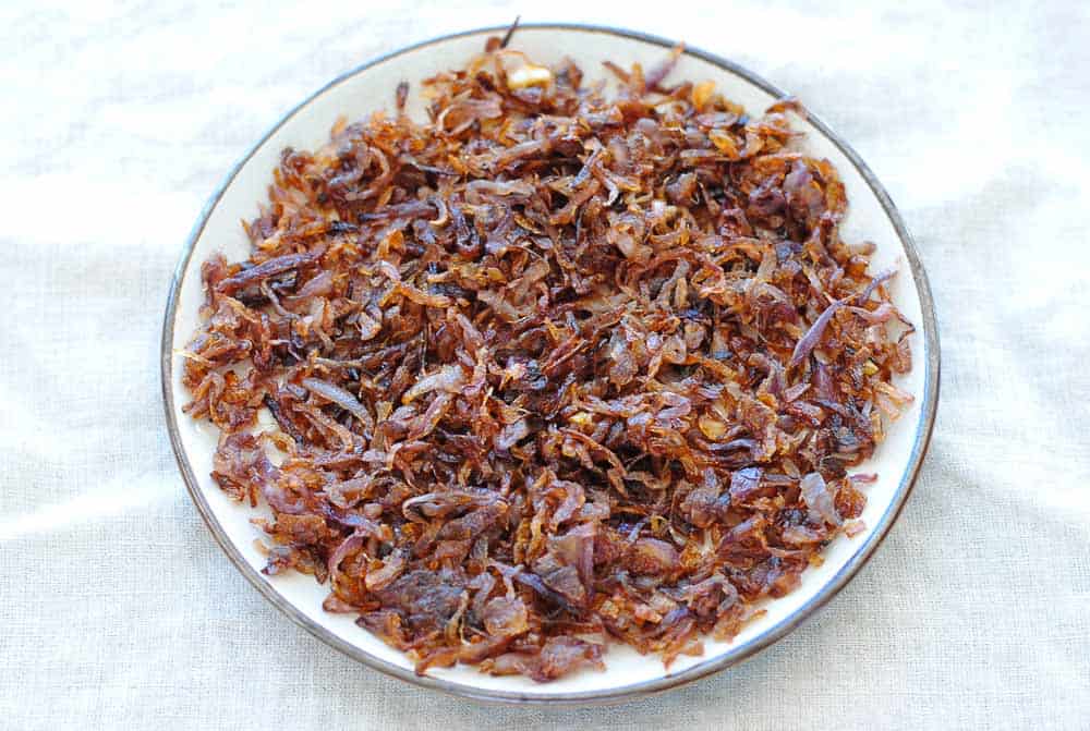 fried onions in a plate