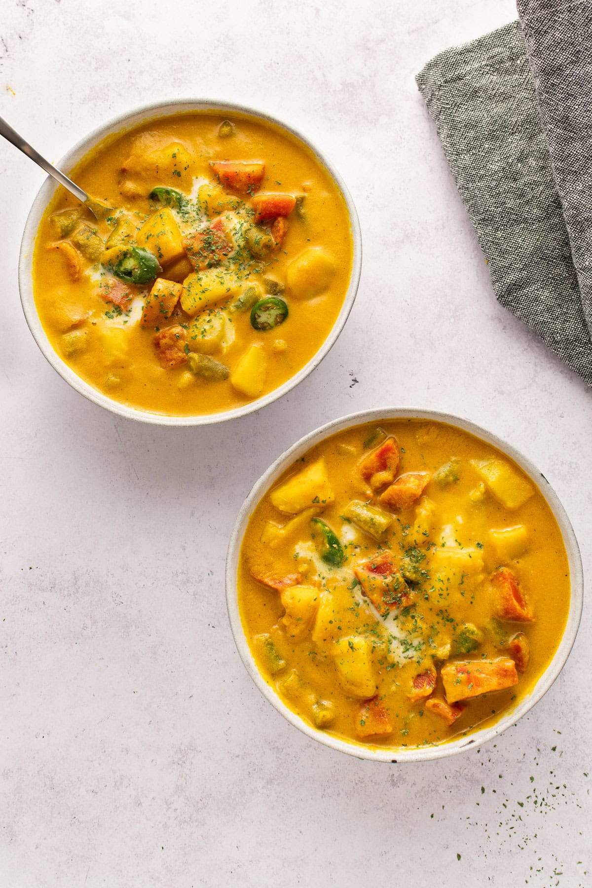 vegetable korma in a brown bowl