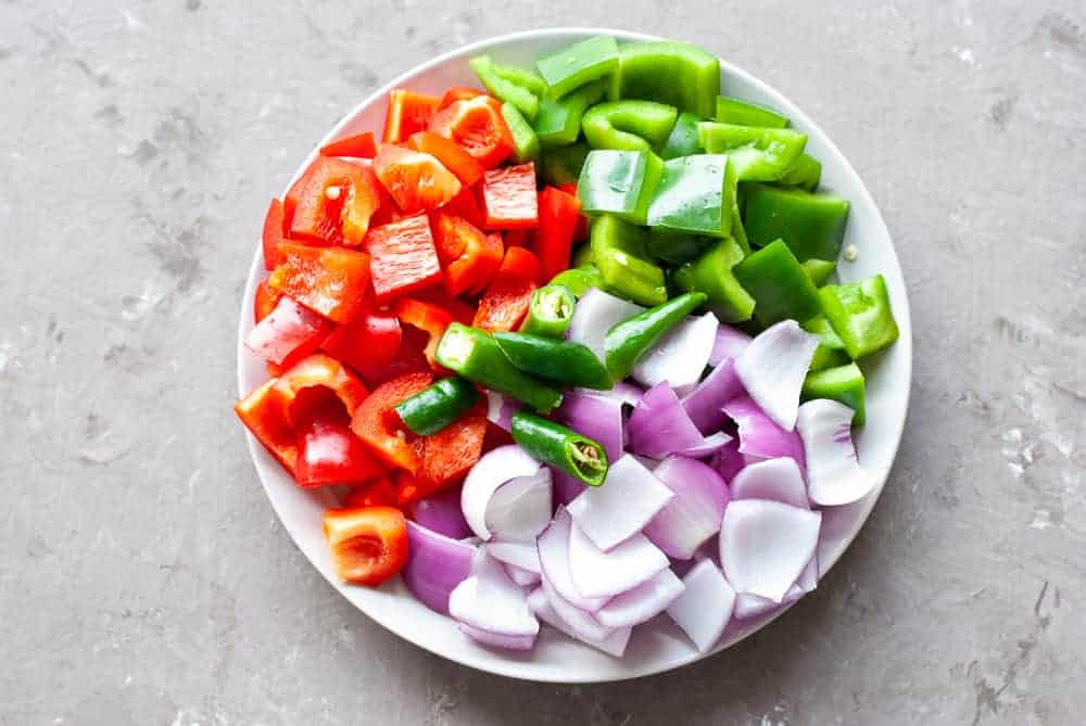 diced onions, green and red peppers and green chillies