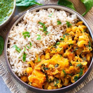 butternut squash and chickpea curry with brown rice in bowl