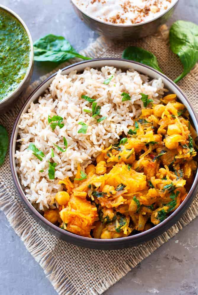 butternut squash and chickpea curry with brown rice in bowl