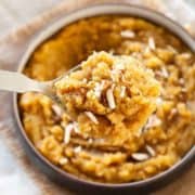 Moong Dal halwa in a spoon over a bowl