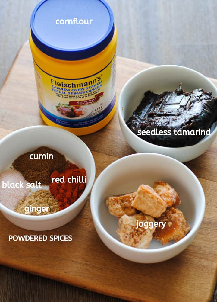 tamarind chutney ingredients - cornflour, powdered spices, tamarind and jaggery