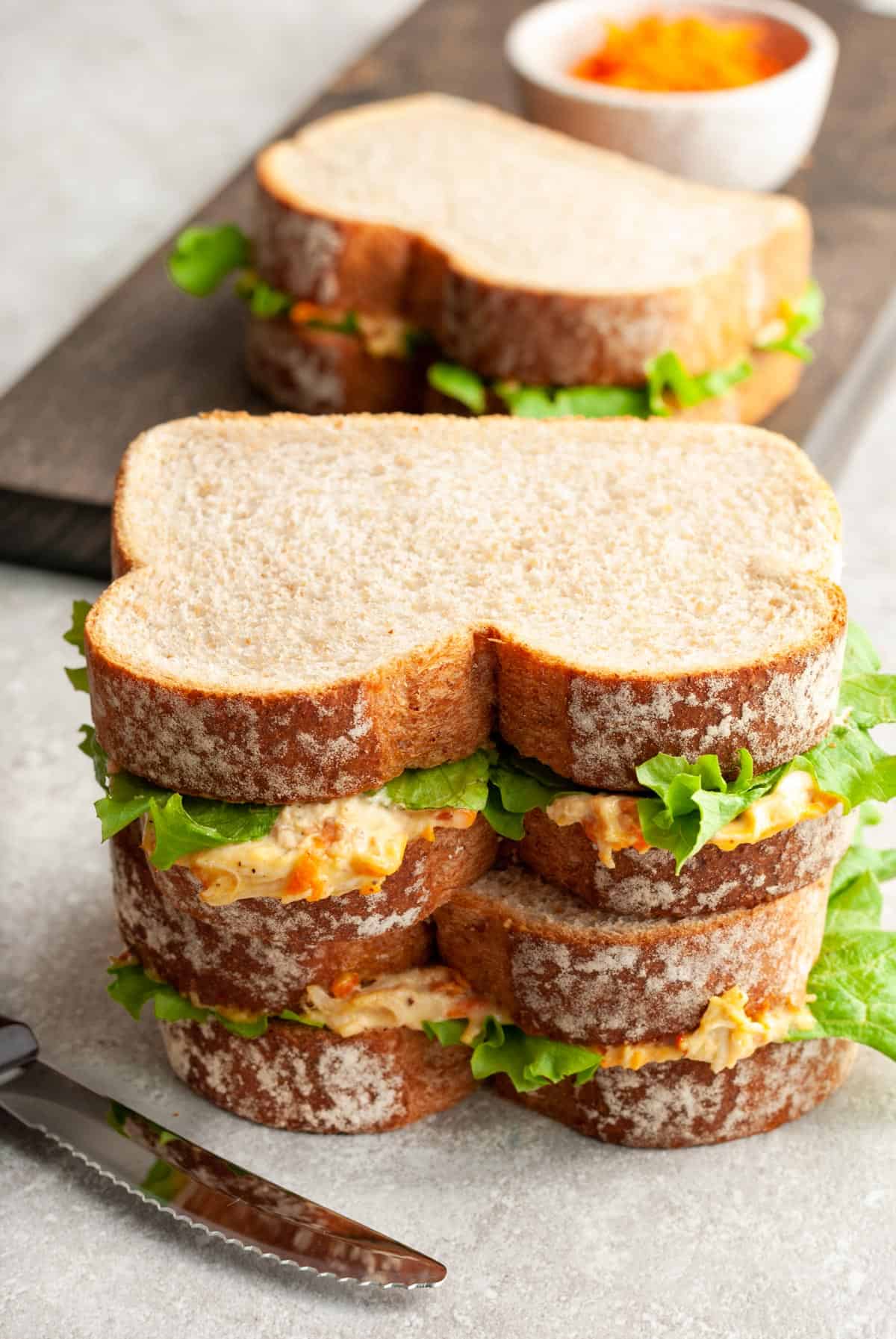 chicken mayonnaise sandwich with lettuce.