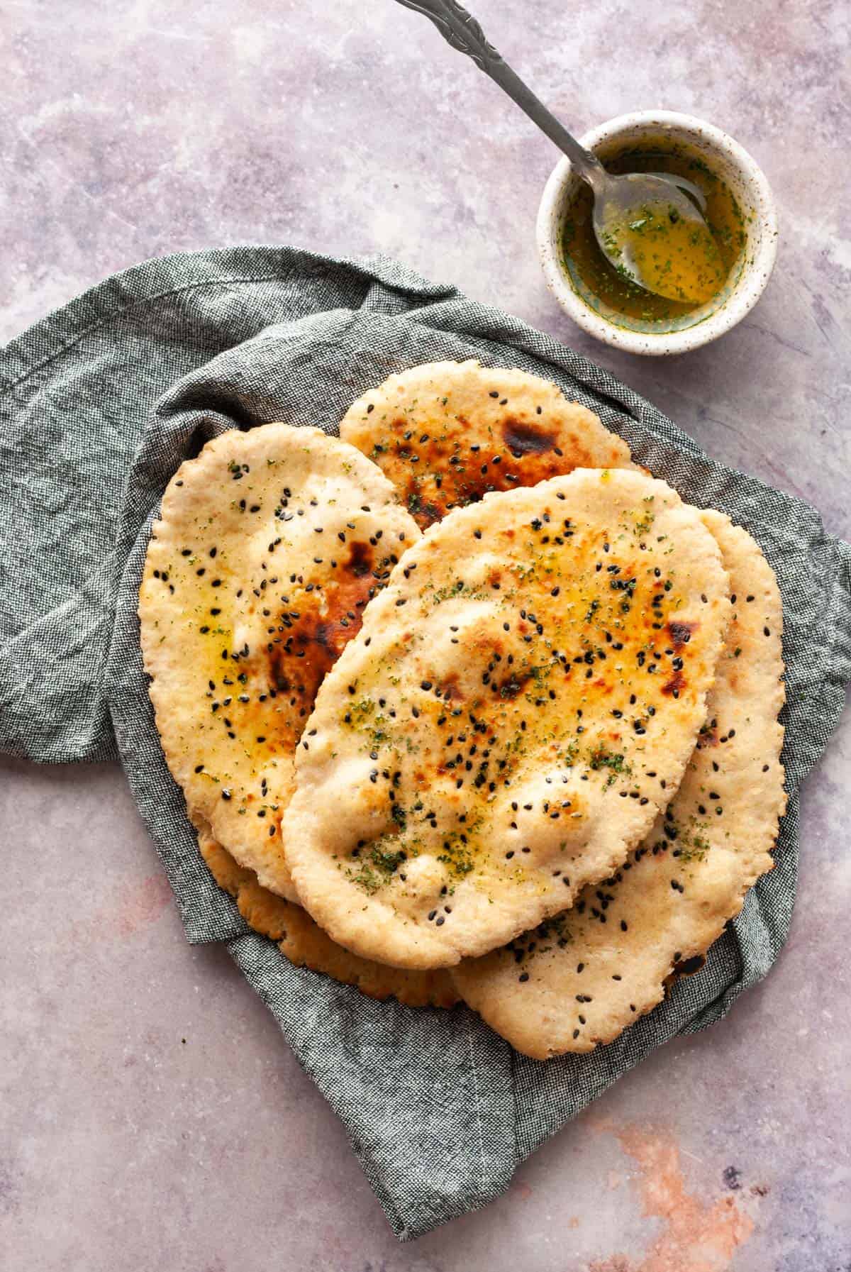 wholewheat naan on grey napkin