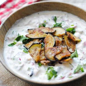 Dahi baingan in a bowl.