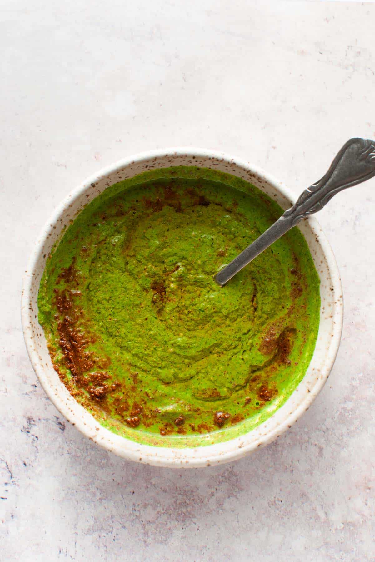 green marinade in a bowl for paneer tikka