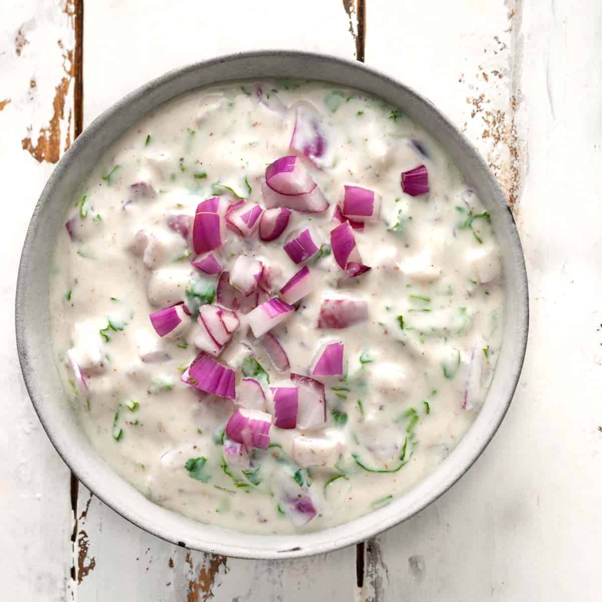 onion raita in a bowl