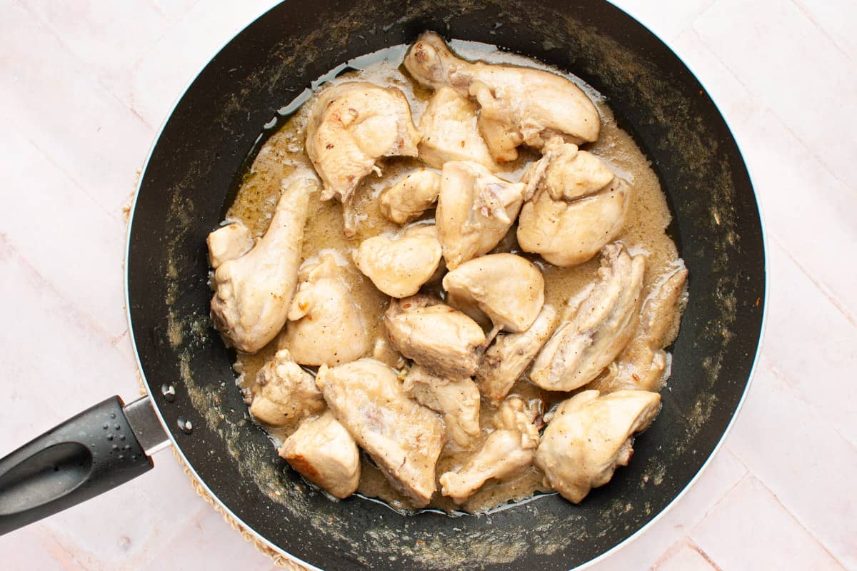 white chicken karahi in a wok (step)