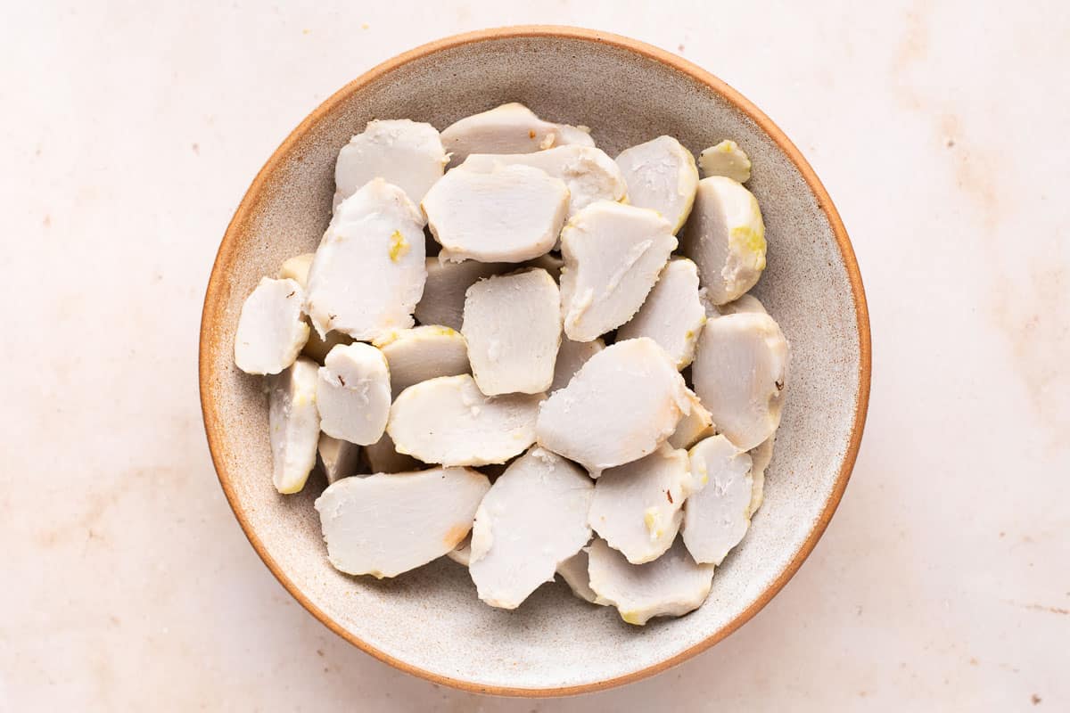Boiled, peeled, and halved arvi or taro root in a bowl.